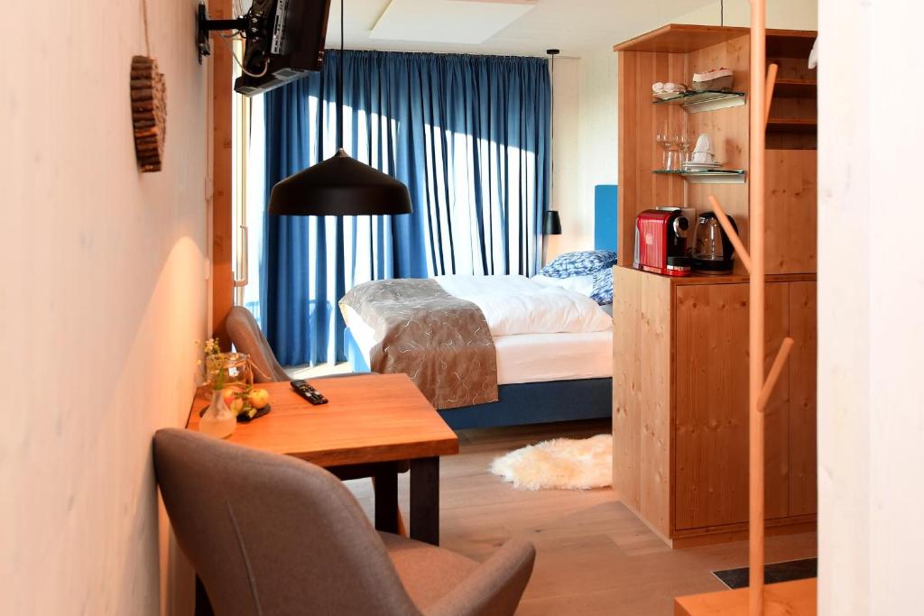 Postel nebo postele na pokoji v ubytování roo'n Lodges#KOLM