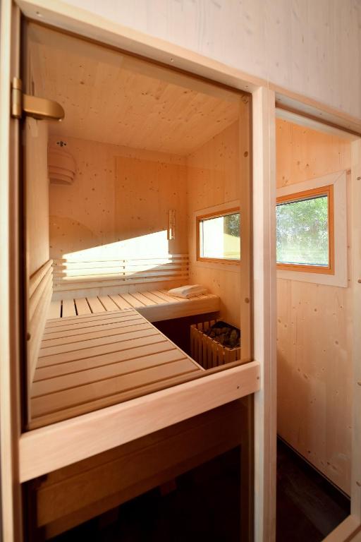 Postel nebo postele na pokoji v ubytování roo'n Lodges#KOLM