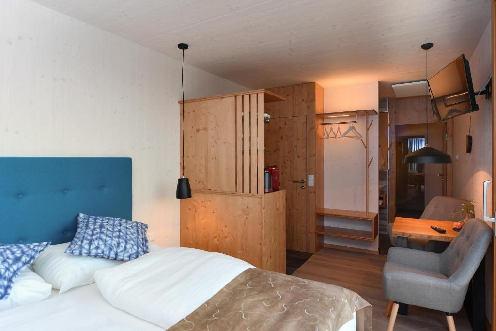 Postel nebo postele na pokoji v ubytování roo'n Lodges#KOLM