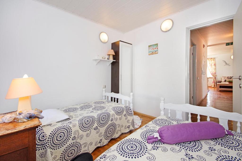 Postel nebo postele na pokoji v ubytování Villa Igrane