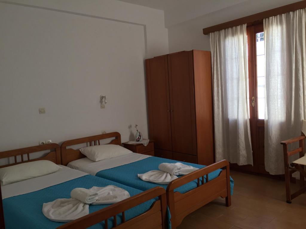 Postel nebo postele na pokoji v ubytování Livanina apartments