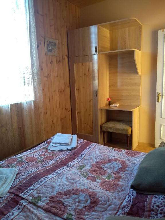 Postel nebo postele na pokoji v ubytování Guest House Guliada