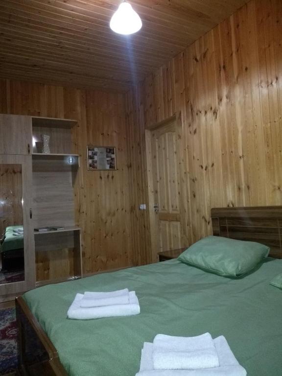 Postel nebo postele na pokoji v ubytování Guest House Guliada