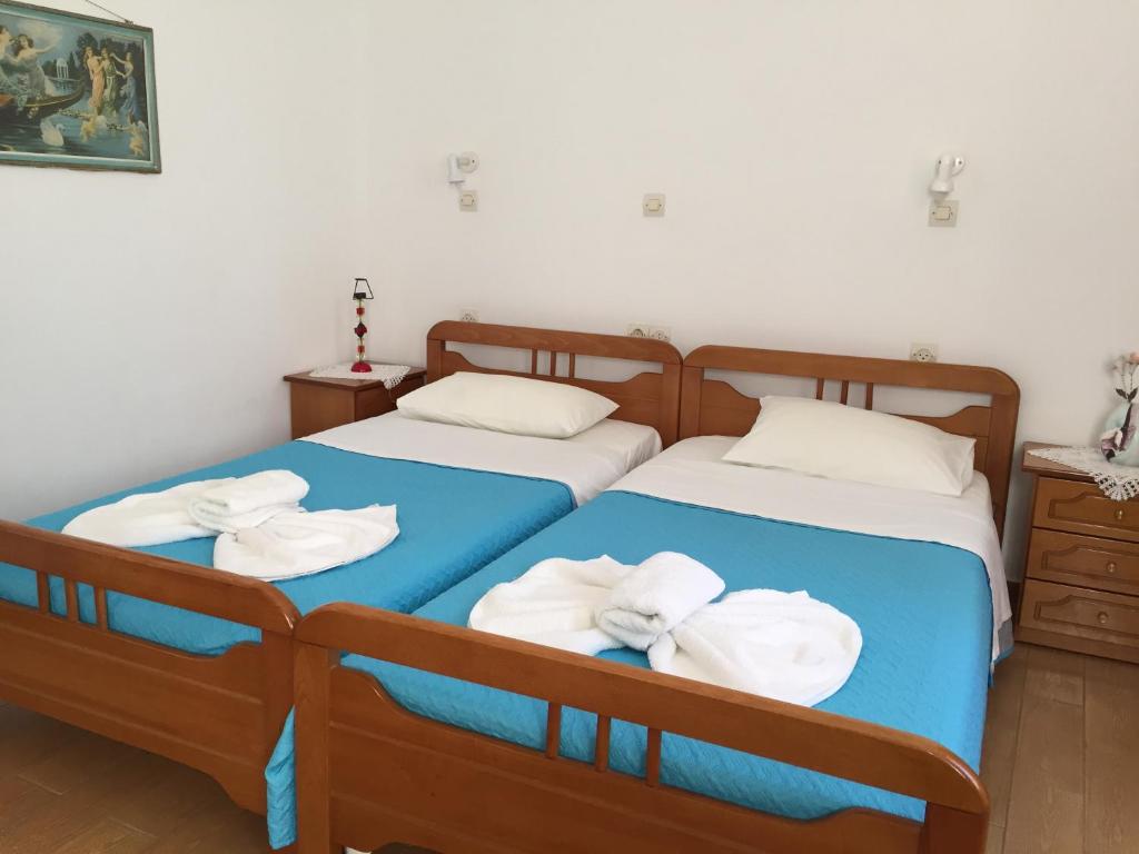 Postel nebo postele na pokoji v ubytování Livanina apartments