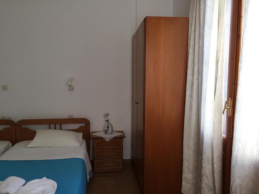 Postel nebo postele na pokoji v ubytování Livanina apartments
