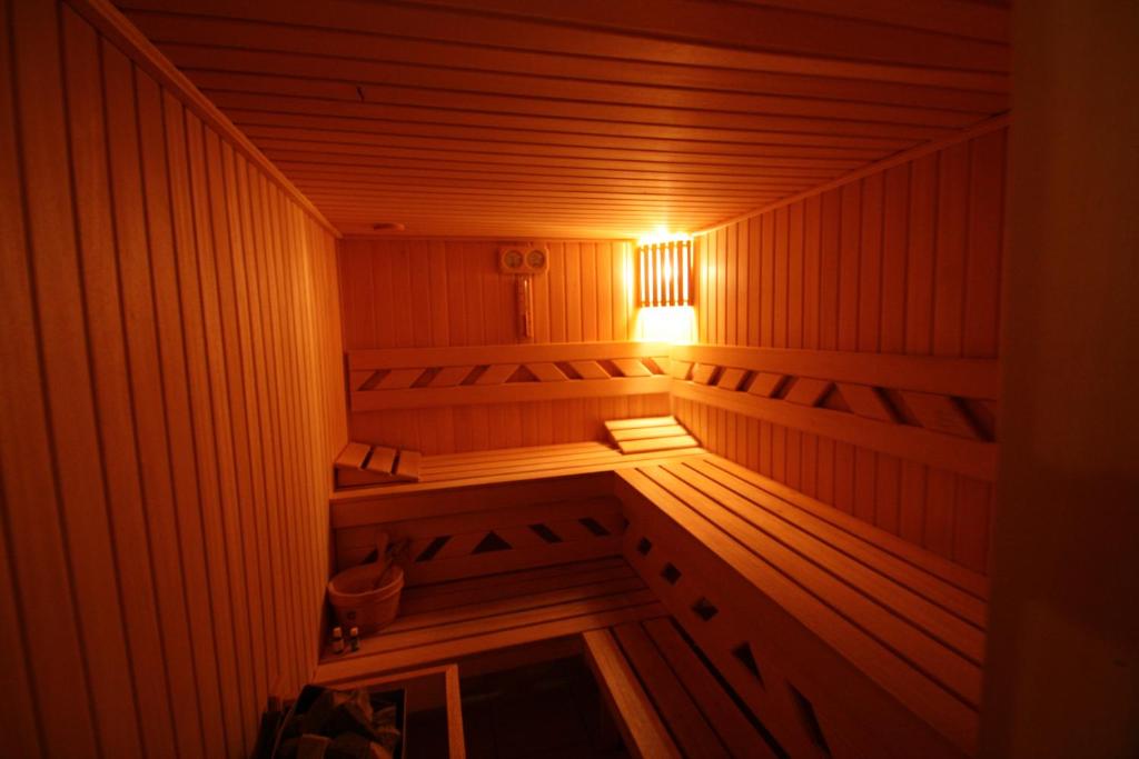an inside of a sauna with a light in it at Rózsa Vendégház in Dunaszentmiklós