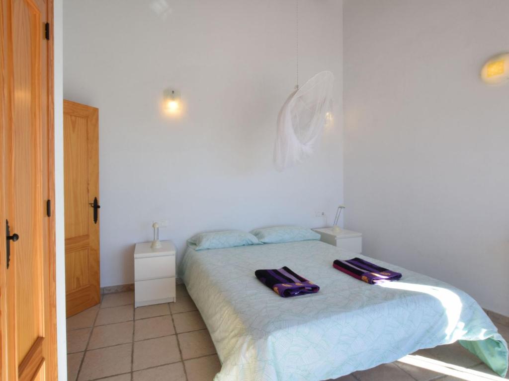 Postel nebo postele na pokoji v ubytování Villa with private pool in Arenas