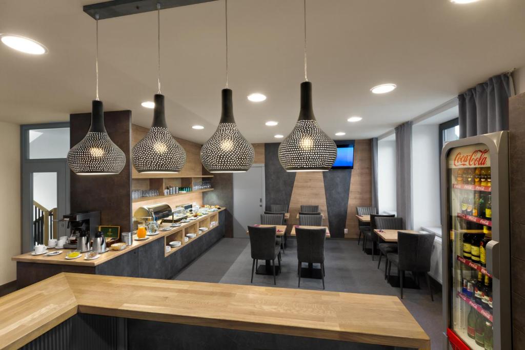 Kuchyň nebo kuchyňský kout v ubytování Ala hotel
