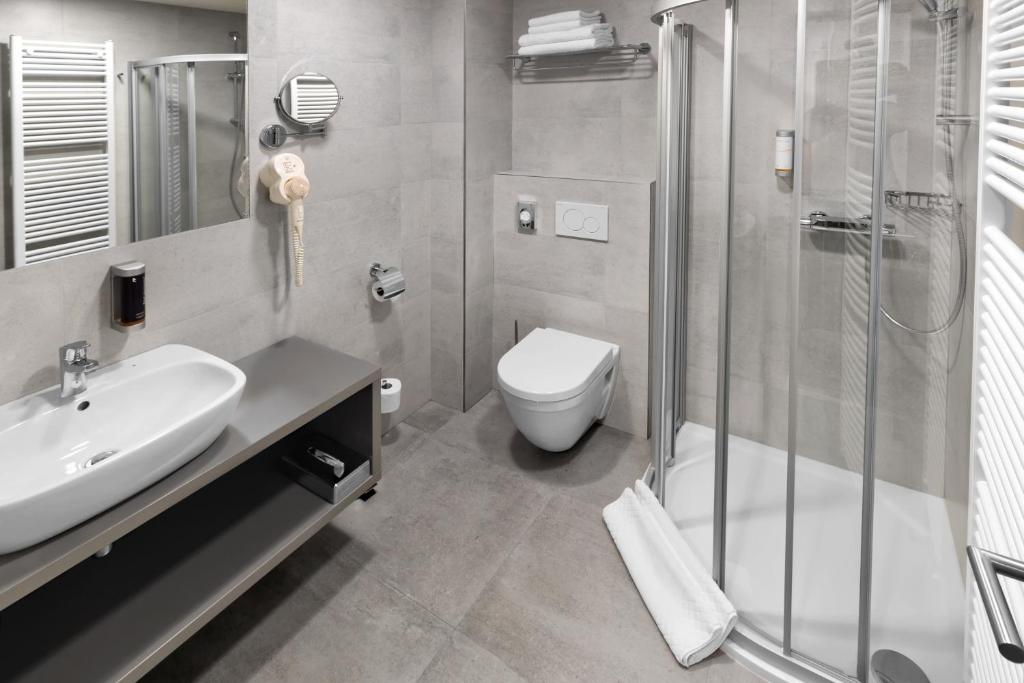 Koupelna v ubytování Ala hotel