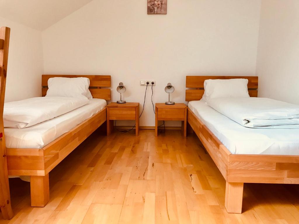 Postel nebo postele na pokoji v ubytování Sonnenblumenhof