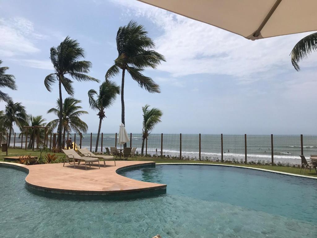 Bazén v ubytování Bali Bahia Itacimirim nebo v jeho okolí