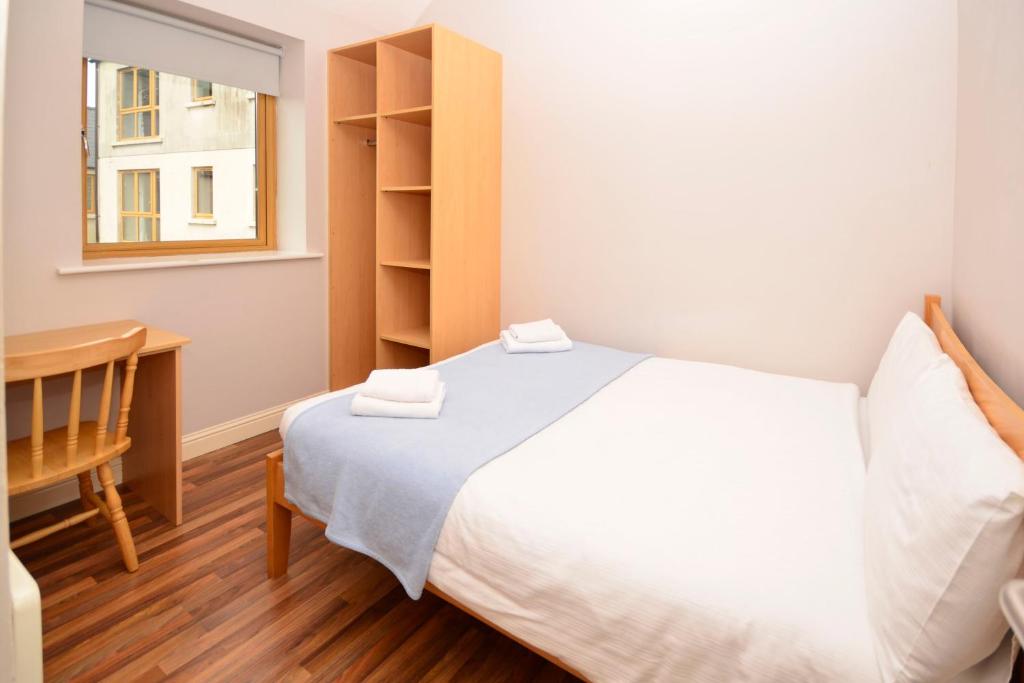 Postel nebo postele na pokoji v ubytování Apartment 705 Letterfrack