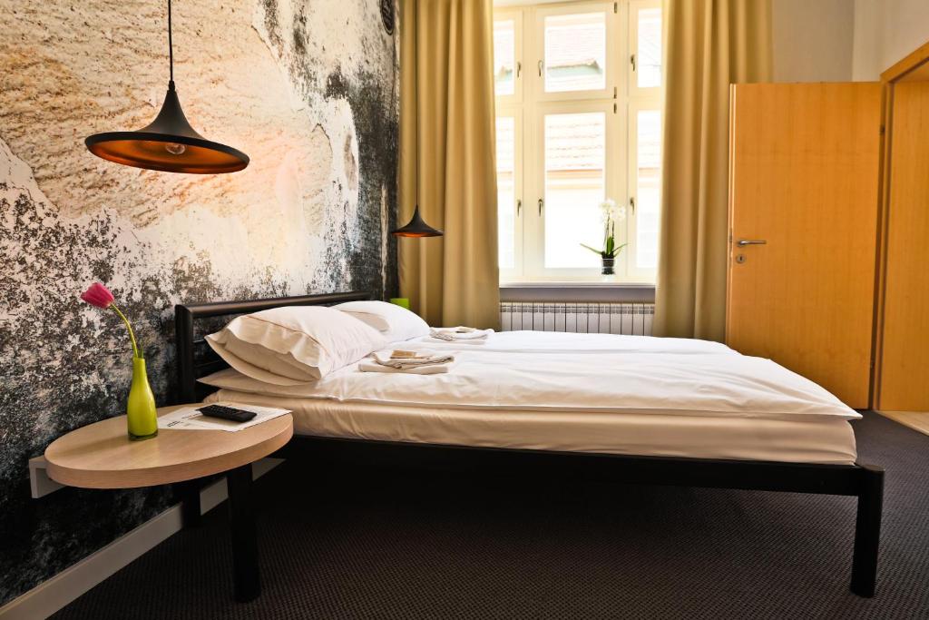 Posteľ alebo postele v izbe v ubytovaní Sleep in Hostel & Apartments Stary Rynek