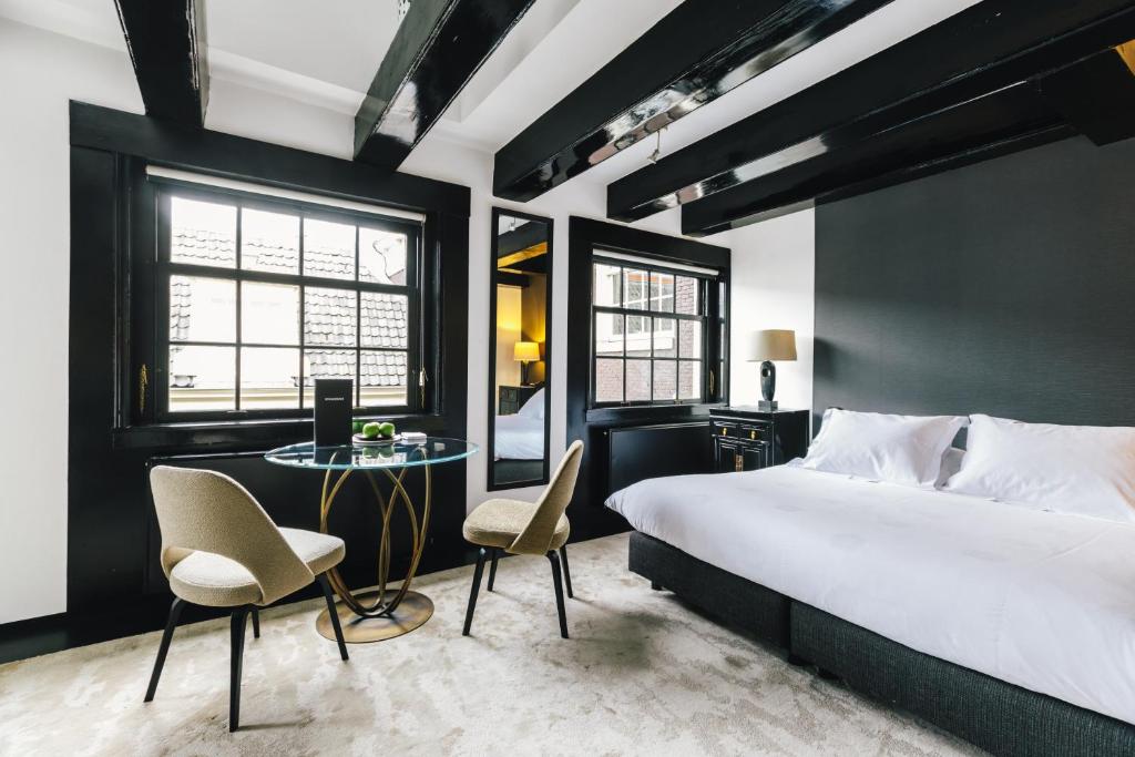 Postel nebo postele na pokoji v ubytování The Dylan Amsterdam - The Leading Hotels of the World