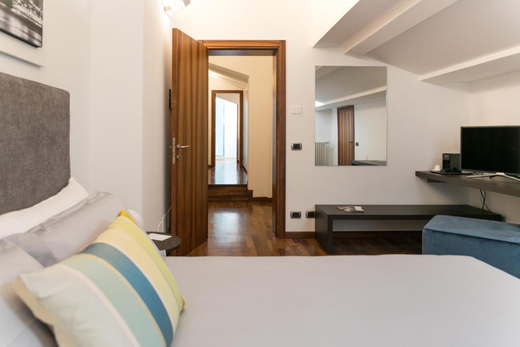 A bed or beds in a room at Corte livia Room & Breakfast