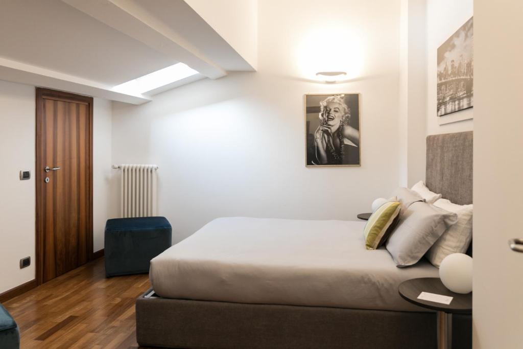 A bed or beds in a room at Corte livia Room & Breakfast