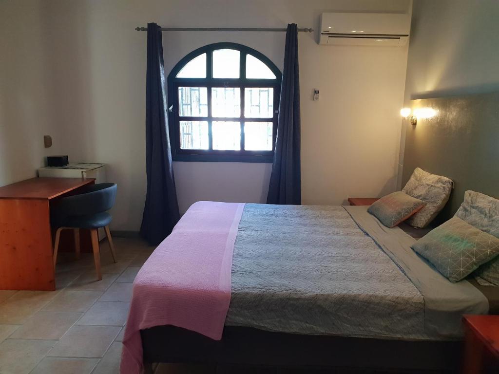 Postel nebo postele na pokoji v ubytování Bed and Breakfast Toni Kunchi