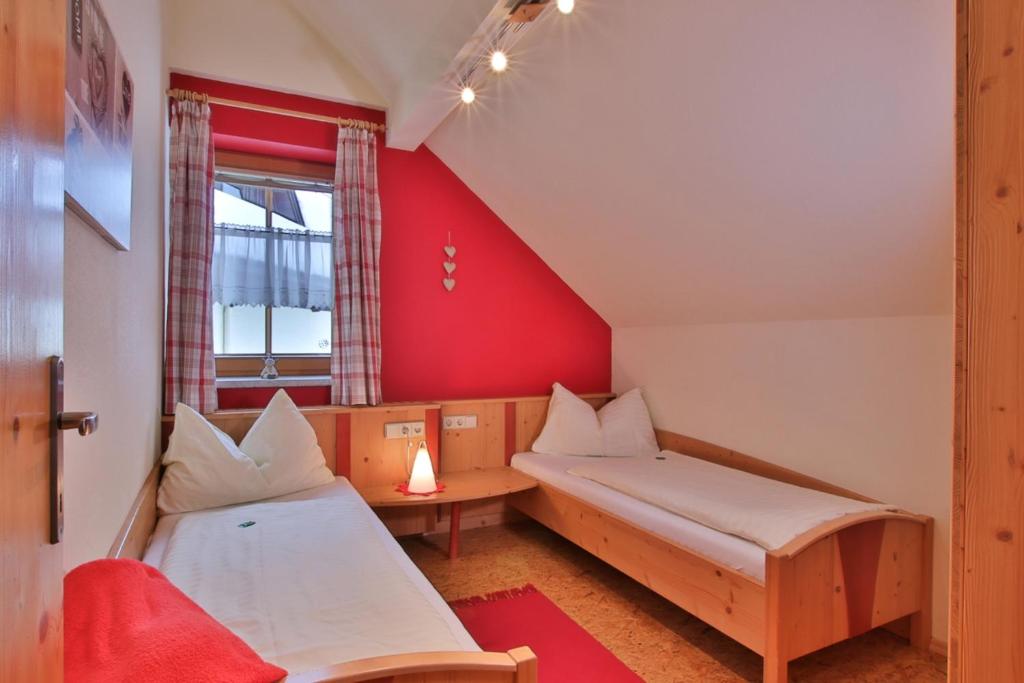 Postel nebo postele na pokoji v ubytování Gästehaus Berger