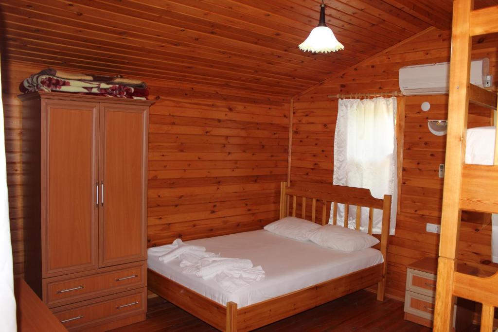 Postel nebo postele na pokoji v ubytování Duran Bungalow