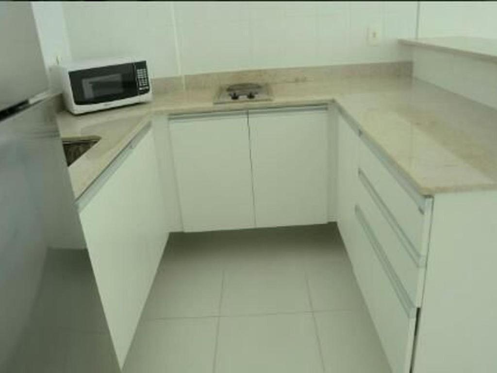  Charmoso e confortável 1 quarto/prédio frente Mar