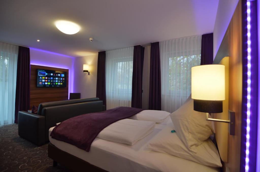 Postel nebo postele na pokoji v ubytování Wohlfühl-Hotel Neu Heidelberg