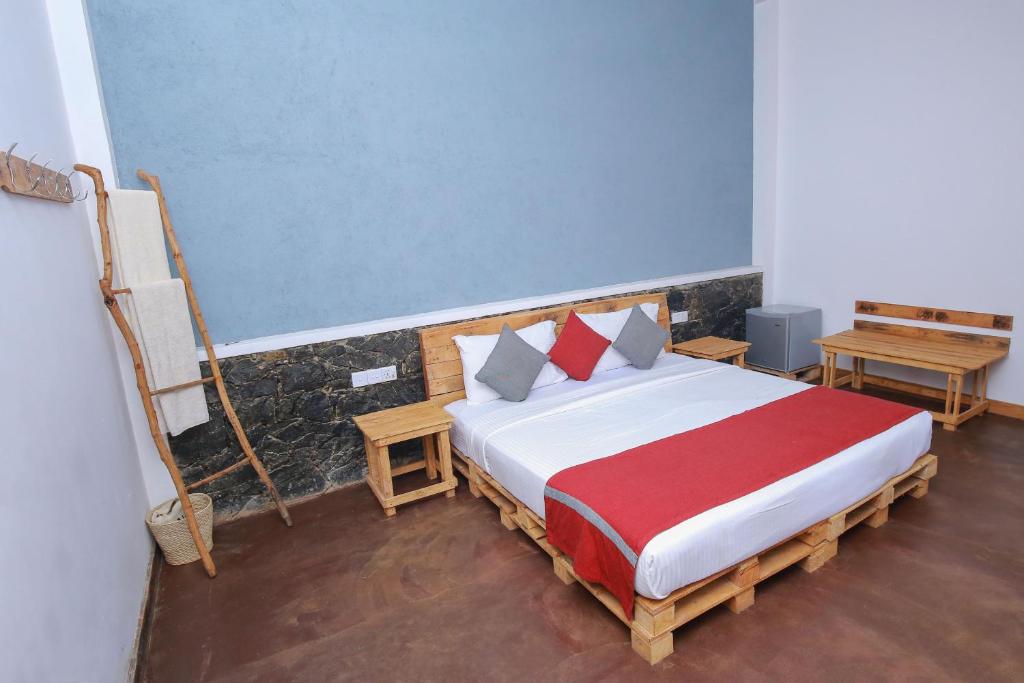 Postel nebo postele na pokoji v ubytování The Spice Lodge