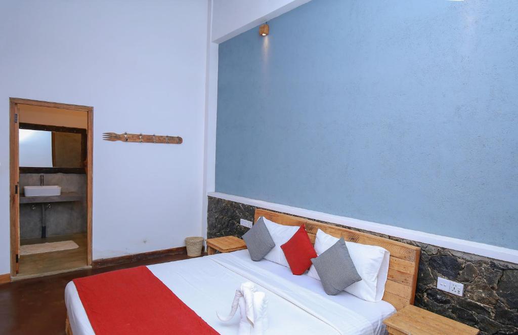 Postel nebo postele na pokoji v ubytování The Spice Lodge