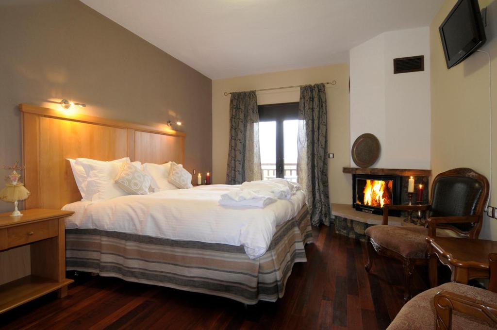 Postel nebo postele na pokoji v ubytování Hotel Mimallones