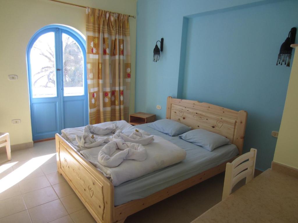 Postel nebo postele na pokoji v ubytování El Primo Hotel Dahab