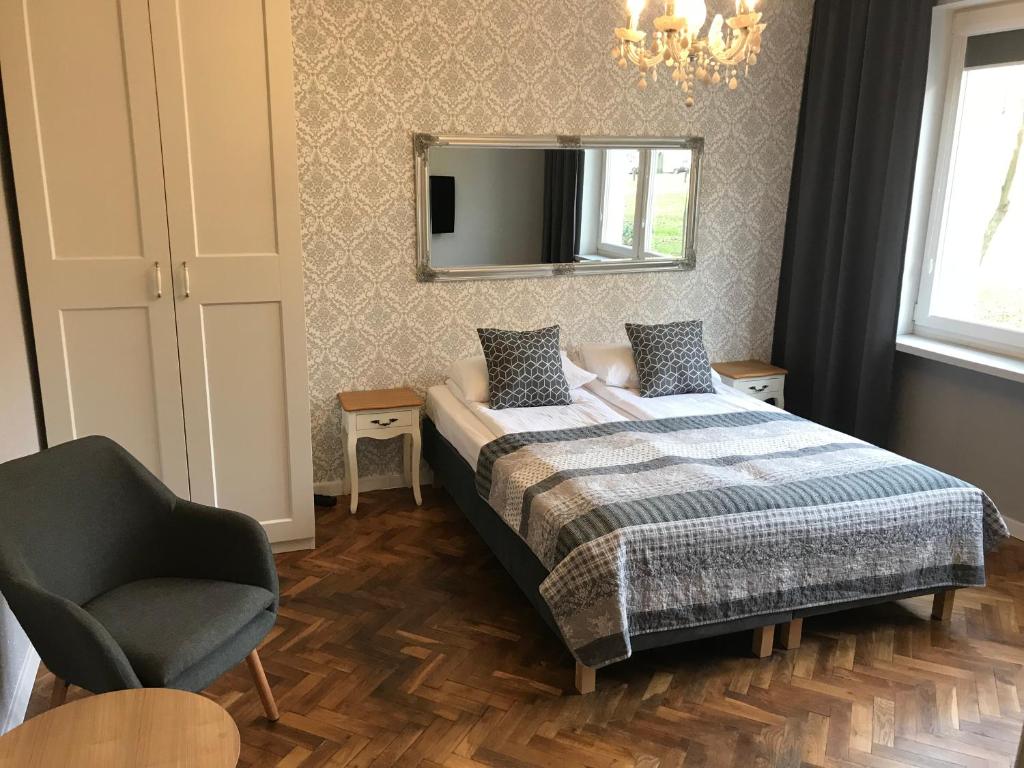 Posteľ alebo postele v izbe v ubytovaní Apartamenty Old Town Mniszki