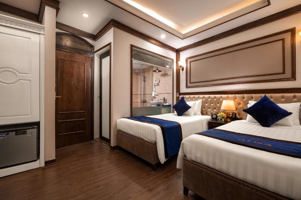Postel nebo postele na pokoji v ubytování Alisa Hotel & Spa
