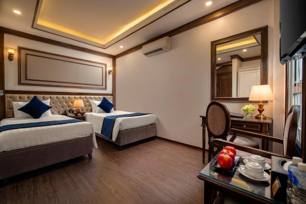 Postel nebo postele na pokoji v ubytování Alisa Hotel & Spa