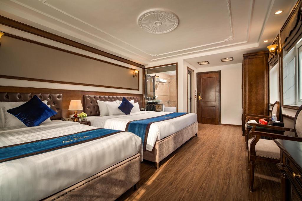 Postel nebo postele na pokoji v ubytování Alisa Hotel & Spa