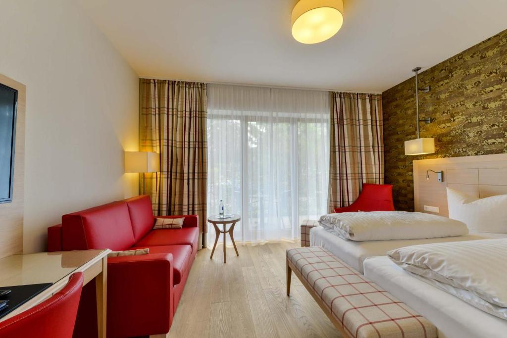 Postel nebo postele na pokoji v ubytování Hotel Pöker