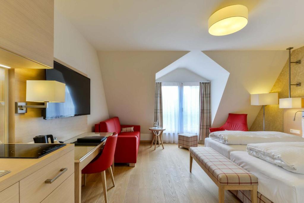 Postel nebo postele na pokoji v ubytování Hotel Pöker