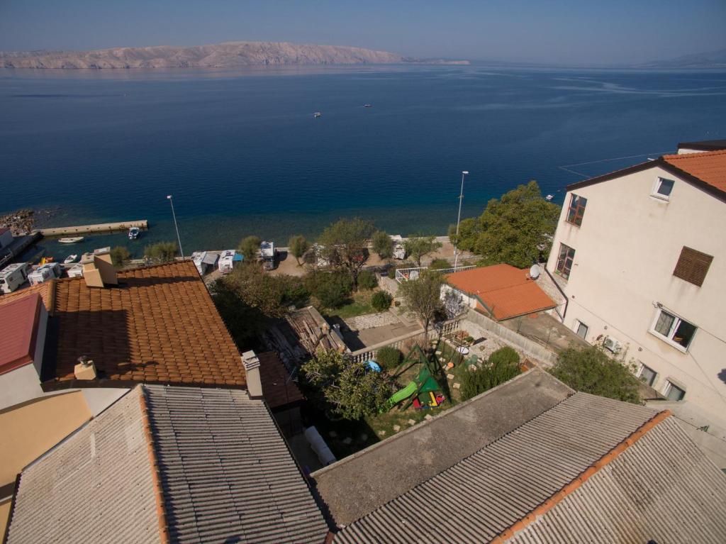 a view of the water from the roofs of buildings at Apartment Marino in Senj