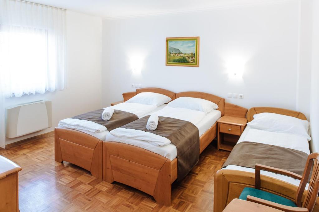 Postel nebo postele na pokoji v ubytování Hotel reAktiv