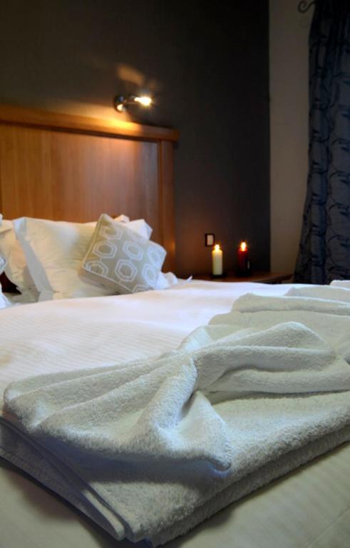 Postel nebo postele na pokoji v ubytování Hotel Mimallones