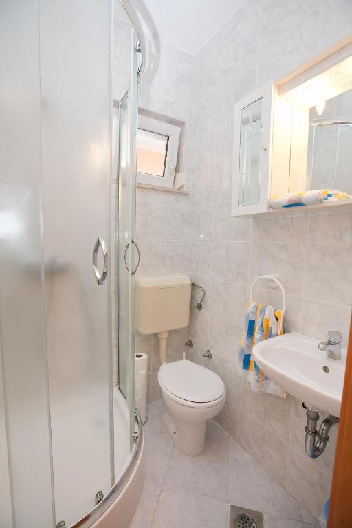 Kúpeľňa v ubytovaní Apartmani Stipe