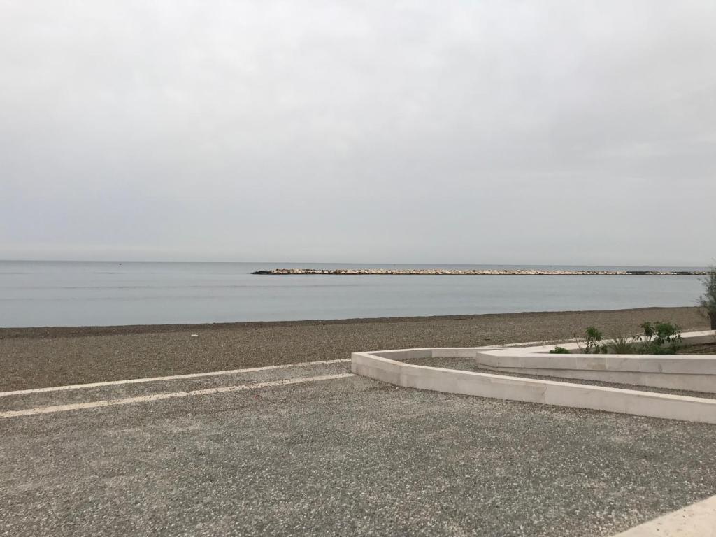 a view of the ocean from a parking lot at Bari Lory’s Home in Bari