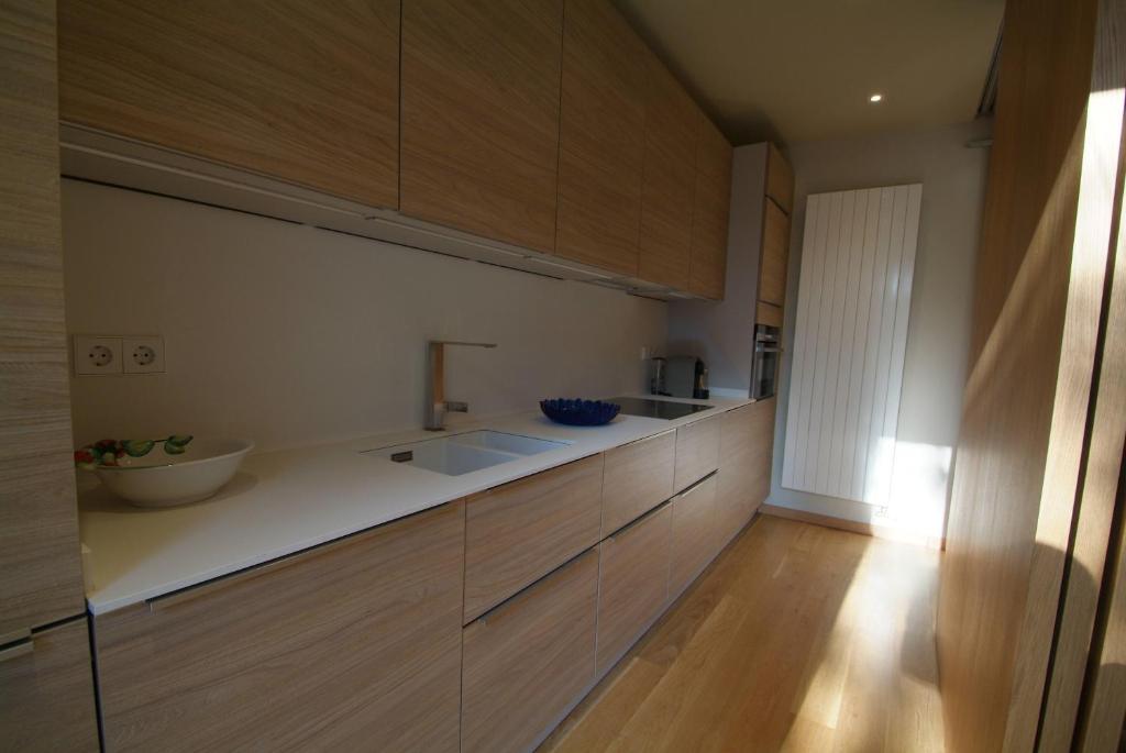 Kuchyň nebo kuchyňský kout v ubytování Beautifully furnished luxury apartment in Barri Vell, Girona