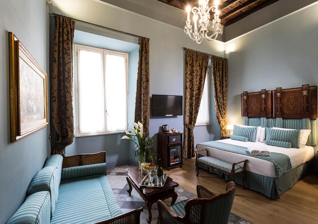 Posteľ alebo postele v izbe v ubytovaní Navona Grand Suite