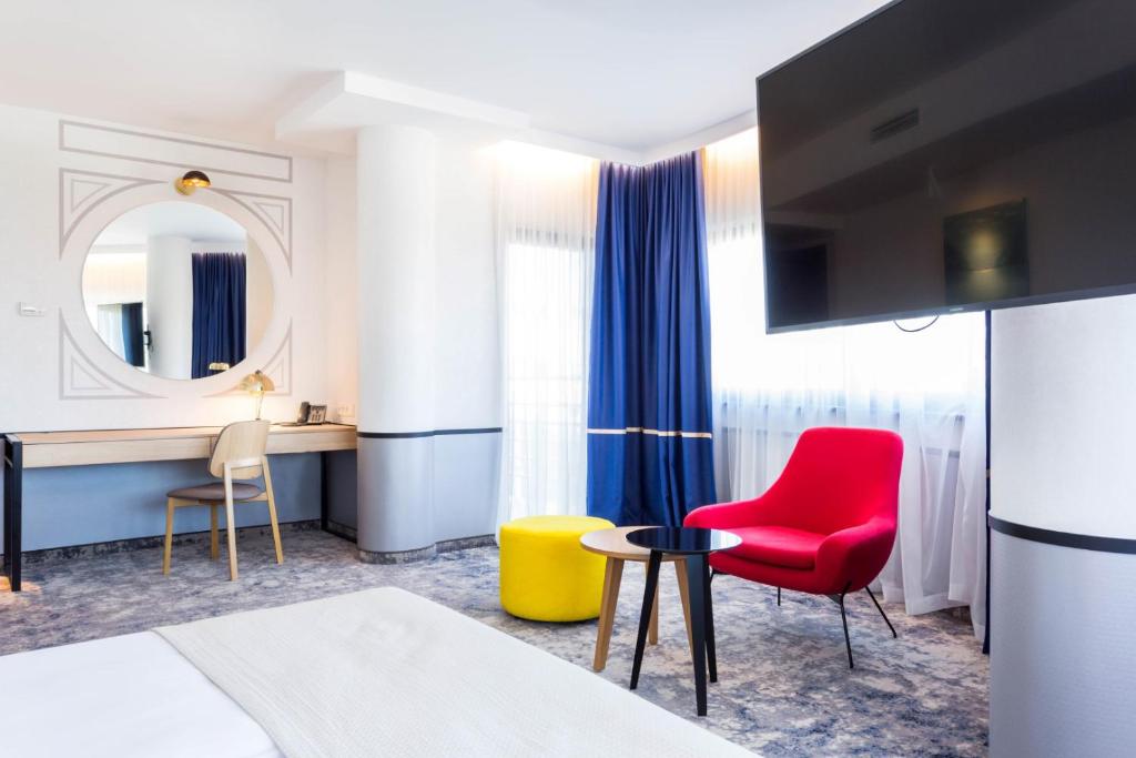 Telewizja i/lub zestaw kina domowego w obiekcie Qubus Hotel Kraków