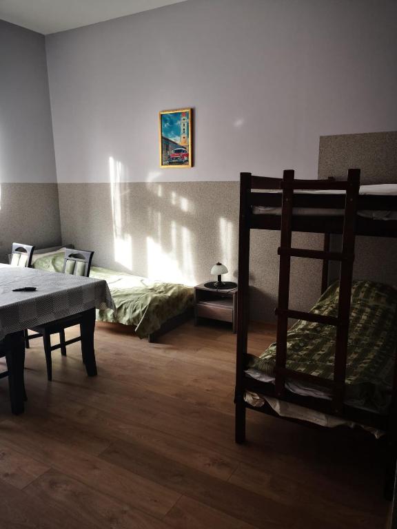 Postel nebo postele na pokoji v ubytování Pensjonat Sielec
