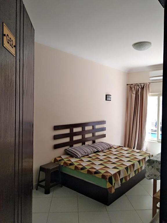 Postel nebo postele na pokoji v ubytování Red Sea Cozy Studio G52
