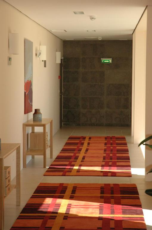 Uma cama ou camas num quarto em INATEL Linhares da Beira Hotel Rural
