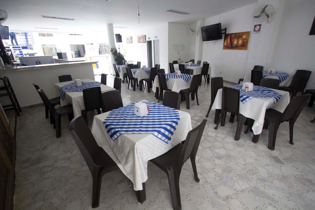 TV a/nebo společenská místnost v ubytování Blue Star Hotel
