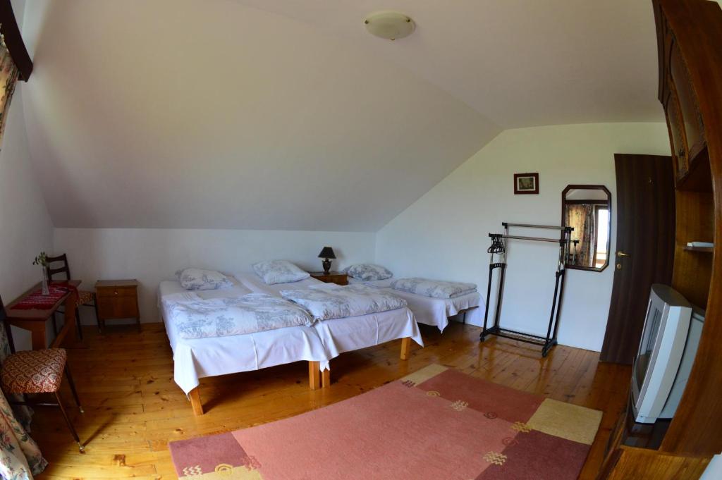 Postel nebo postele na pokoji v ubytování Casa Altius Felix