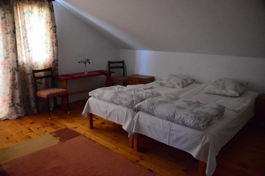 Postel nebo postele na pokoji v ubytování Casa Altius Felix