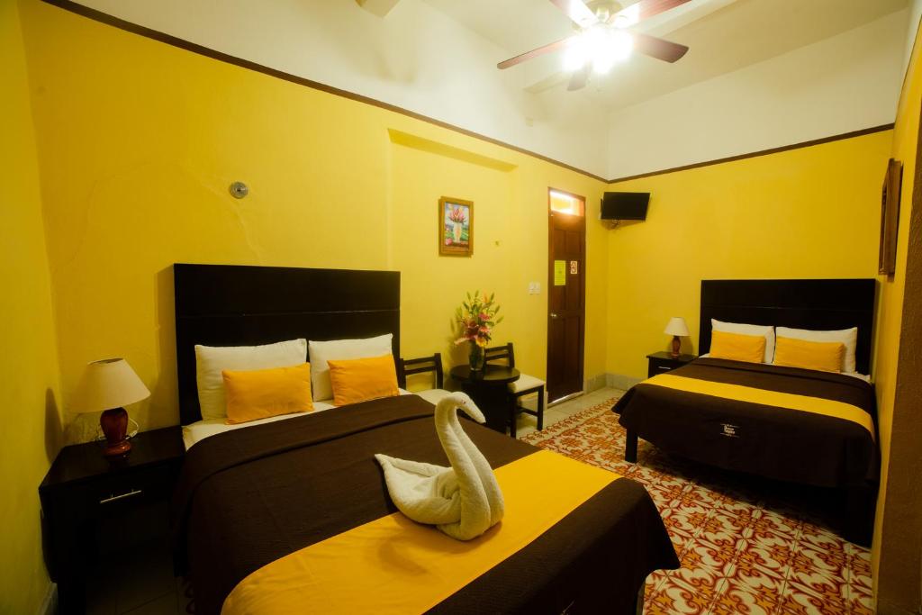 Postel nebo postele na pokoji v ubytování Hotel del Peregrino Boutique Hotel